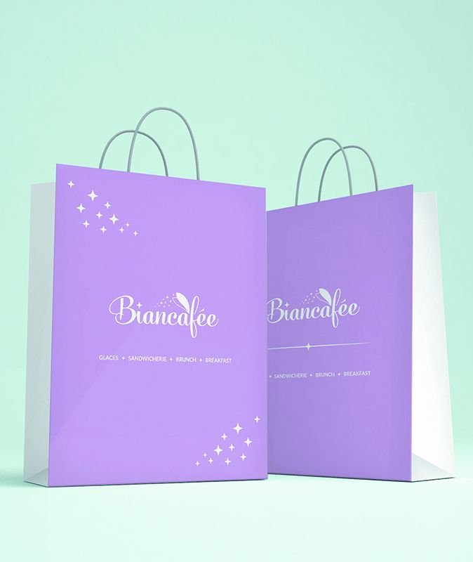 Sacs en papier imprimés pour une boutique, deux formats assortis